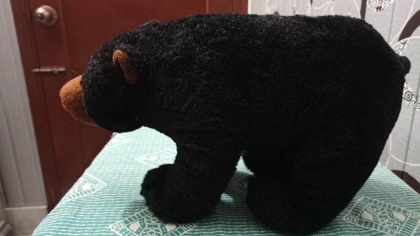 Realistic Black Bear Stuffed Animal with Brown Muzzle and Inner Ears